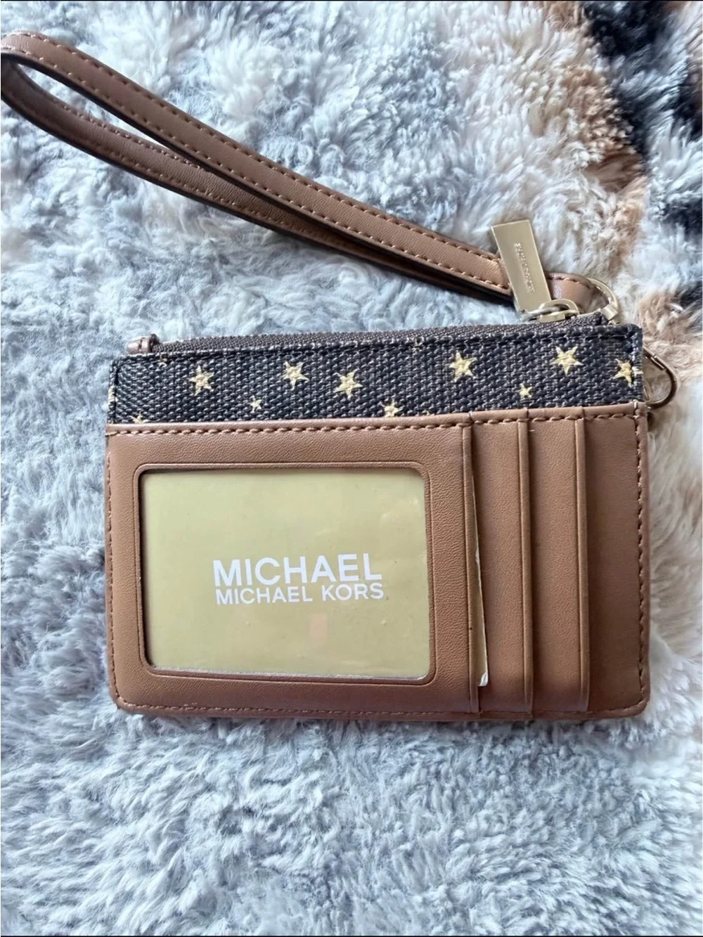 Michael Kors Black Wristlet with Gold Star Print